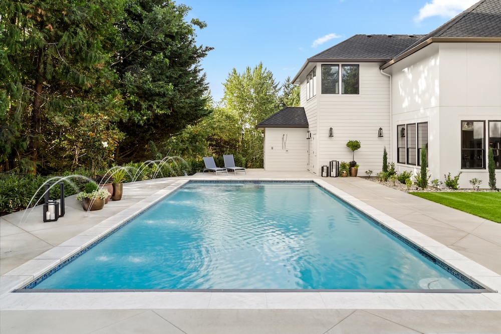 in-ground pool with blue water